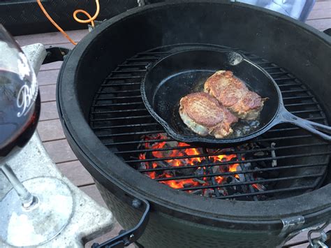 Brush the filets lightly all over with the oil. Filet Mignon on a cast iron skillet — Big Green Egg ...