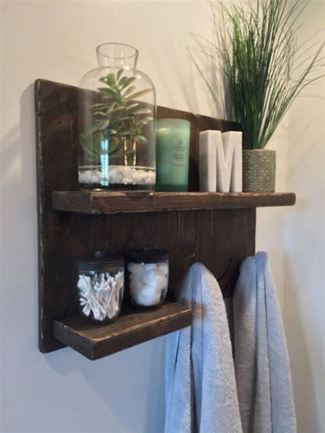 Storing bathroom towels in boxes is very practical. Cool 43 Creative DIY Hanging Towel Storage Designs Ideas ...