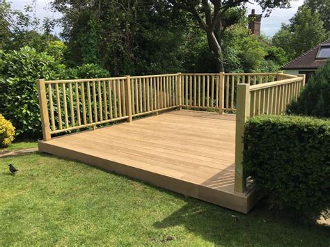 Spindles are pieces of solid timber that are machined in a lathe to be used as a decorative support for any handrail/base rail combination. Golden Oak Millboard Decking - Softwood handrails | Deck installation, Deck, Outside patio