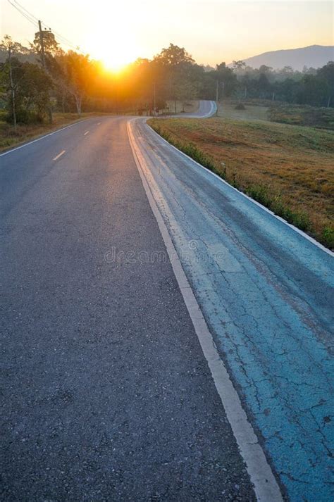 A Long Curvy Road In The Mountain Stock Photo Image Of Ride Pavement
