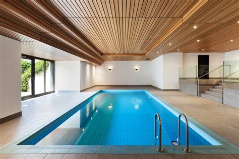 Residential pool design dates back to california in the 1930s, when wealthy movie stars were able to afford houses with landscaping that blended the indoor/outdoor lifestyle. 75 Cool Indoor Pool Ideas and Designs for 2018