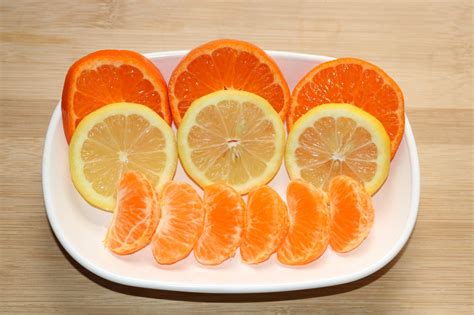 Orange And Lemon Slices On Plate Free Stock Photo Public Domain Pictures