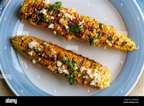 Mexican Street Corn Also Known As Elote Served With Chili Mayonnaise