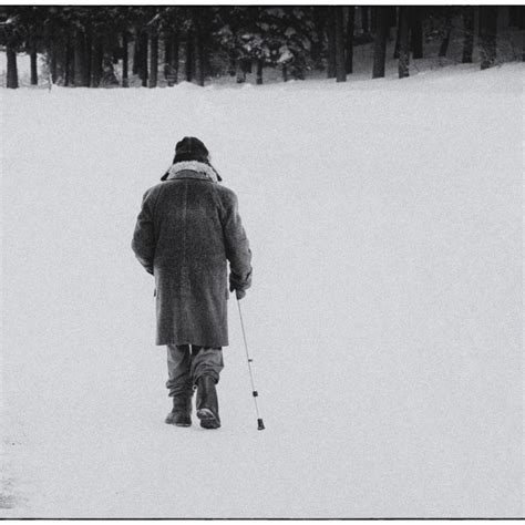 Old Man Walking Through The Snow License Download Or