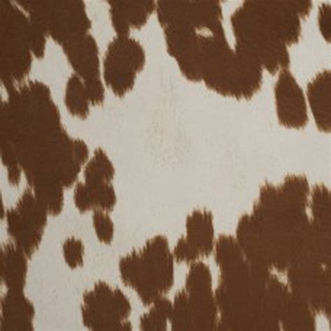 This Is A Brown And Off White Faux Fur Cow Hide Design Upholstery
