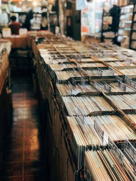 Many Records Are Stacked On Top Of Each Other In The Stores Record Room
