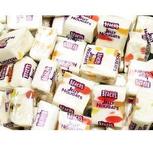 The sweetest vanilla nougat, wrapped up in soft buttery caramel, with a layer of pecans on the outside to make a perfect candy log. Brach's Jelly Nougats candy in 2019 | Old candy, Candy ...