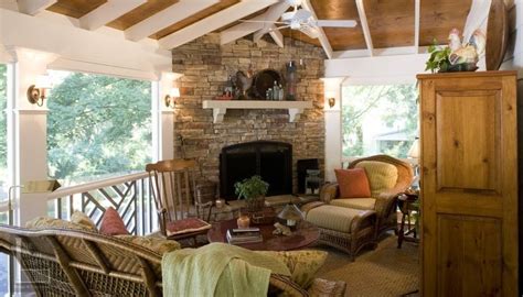 Screened Porch With Fireplace And White Rafters The