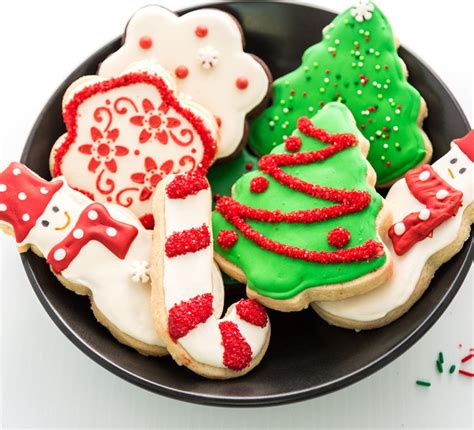 A special sprinkle mix with red holly berries mixed right in makes this adorable christmas tree cookie extra festive. Christmas Sugar Cookies - Cook With Manali