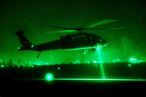 Night Vision View Of Uh 60l Black Hawk Helicopter Departing From