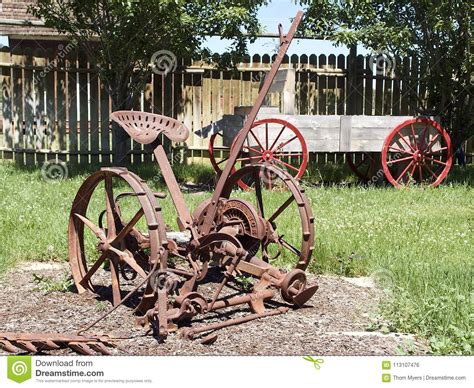 Old Farm Equipment In The Garden Stock Photo Image Of Equipment