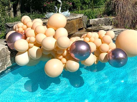 Compare a treated balloon with an untreated one. Pool Balloons in 2020 | Pool birthday party, Balloons ...