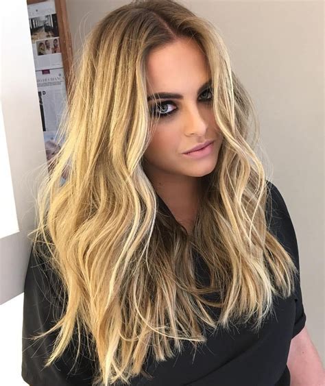 Long Blonde Balayage Beach Waves For This Look Start By Blowing Out Clean Hair To Get A