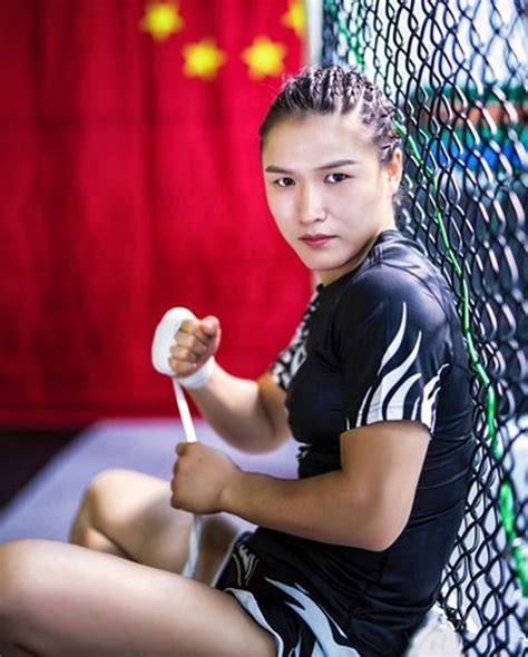 Daniel cormier runs up on jake paul! 'I'm not Yao Ming': China's first UFC champ Zhang Weili ...