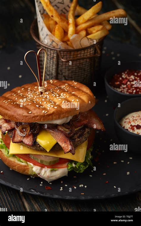 Burger With Fries Stock Photo Alamy
