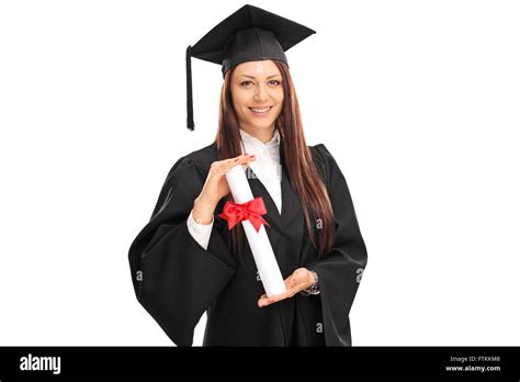 Female graduate student in a black graduation gown holding a diploma ...