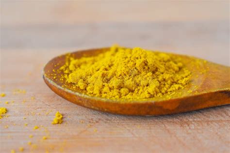 Curry Spice In Wooden Spoon Stock Image Image Of Flower Vegetable