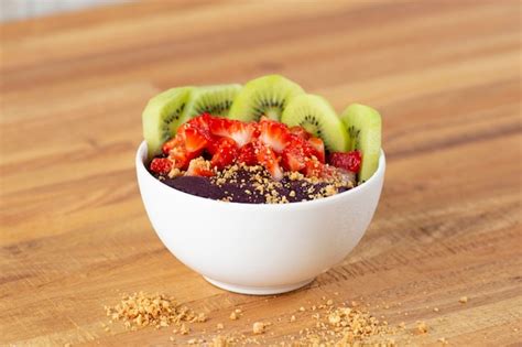 Premium Photo Açaí Bowl With Strawberry And Mango Topping