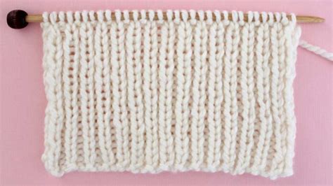 Watch this two part instructional knitting video to knit a 1x1 rib stitch using an even number of stitches. 1x1 Rib Stitch Knitting Pattern for Beginners | Studio Knit