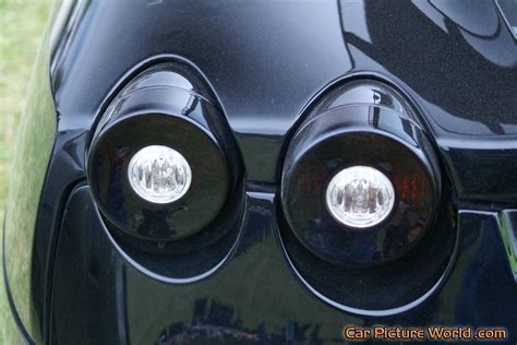 Comes up fast while camera car changes lanes? Ferrari F430 Black Tail Lights Picture