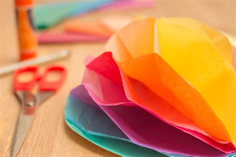 Take multiple sheets of tissue paper and layer them on top of each other, now fold these in half to make double the layers, then fold in half again to. How to Make Honeycomb Designs With Tissue Paper ...
