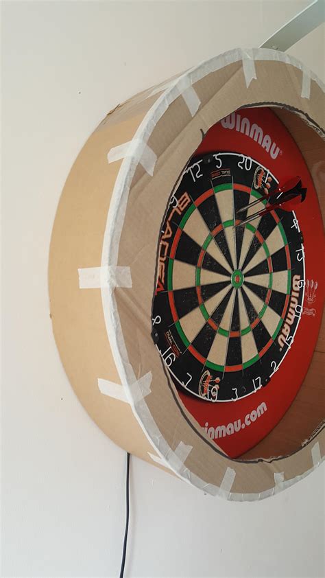 Clever and crafty dartboard surrounds to protect a wall from stray darts. Diy Dartboard Surround