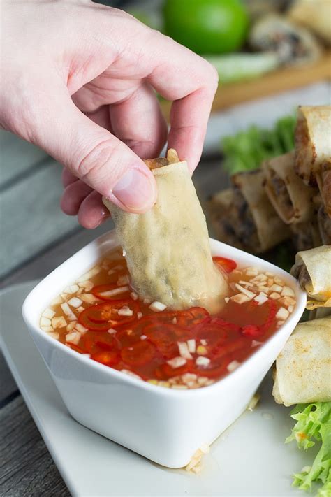 Continue wrapping, folding in the sides as you go until you have wrapped the eggroll into a log shape. vietnamese dipping sauce for egg rolls