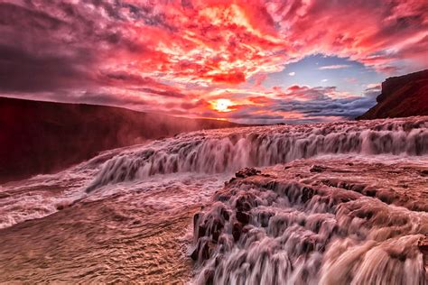 Spectacular Sunset On A Waterfall Clouds Waterfalls Nature Sunset