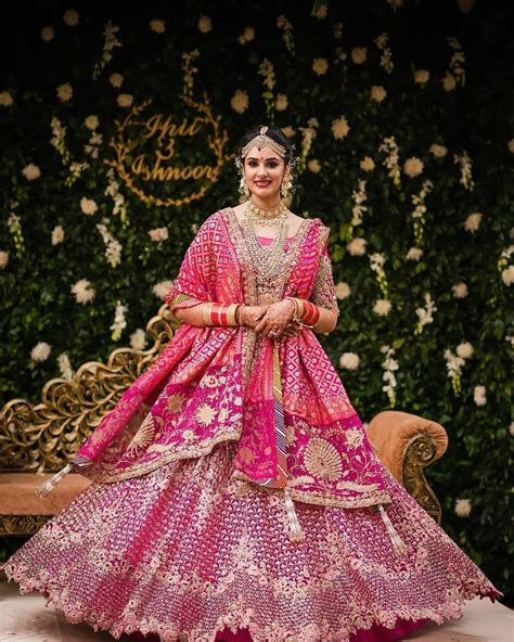 10 Of The Most Unique Fuchsia Lehengas We Spotted On Real Brides Wedmegood