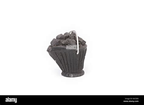 Lump Of Coal Carved Into Miniature Coal Bucket Isolated On White