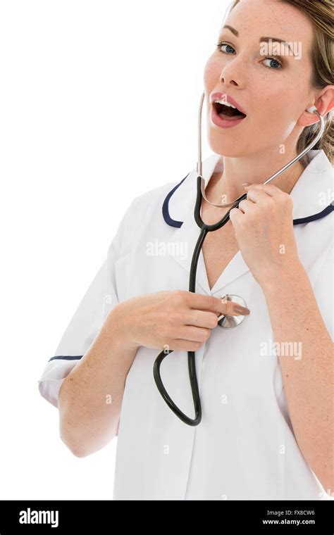 Female Doctor With A Stethoscope Listening To Her Own Chest Isolated