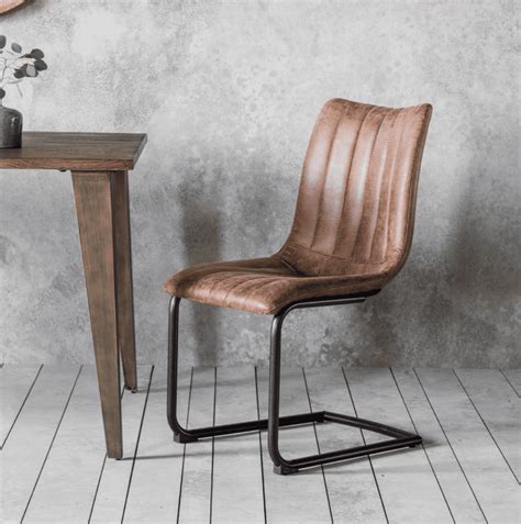 Dining chairs to add style and comfort to your dining room. Faux Leather Kuta Chair - Brown • BluBambu