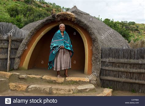 Sotho Woman In Front Of Hut Basotho Cultural Village
