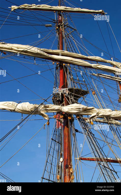 Mast Of Old Sailing Ship Against Blue Sky Stock Photo Alamy