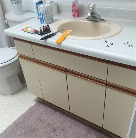 Vanity cabinets are often sold with a particular finish already on them, ready for use in the bathroom without any finishing required. Bathroom Update + How to Paint Laminate Cabinets — The ...