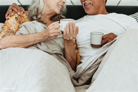 Download Premium Image Of Cheerful Elderly Couple Having A Morning Coffee