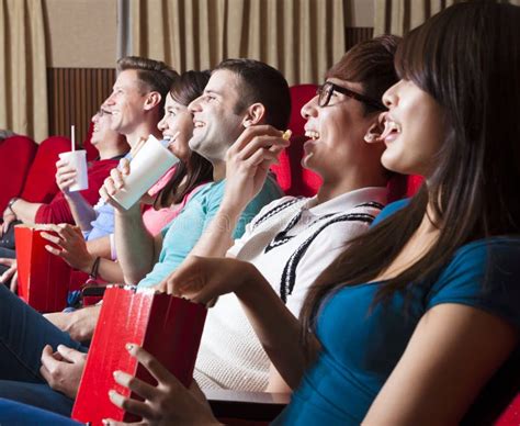 Young People Watching A Movie At The Cinema Stock Image Image Of