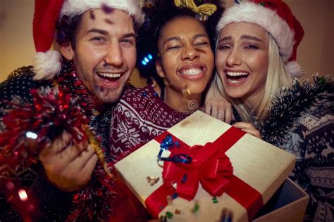 Friends Laughing Celebrating Christmas Looking At Camera Stock Image Image Of Holiday Afro