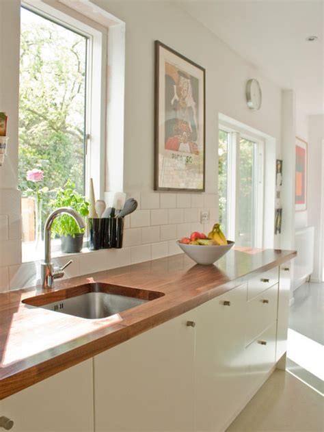 Making sure the right side matched the left side so that they were perfectly interlocking seeing you work on the tile reminds me of my own experience installing our kitchen backsplash a couple of months ago. Tile Around Kitchen Window | Houzz