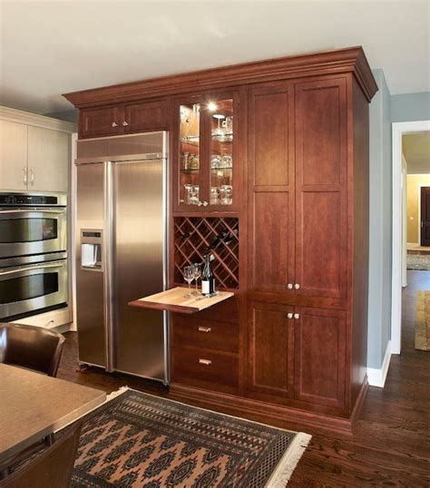 Install under cabinet wine racks and arrange all wine collection. Hidden Wine Rack - Transitional - kitchen - Kristin Petro ...