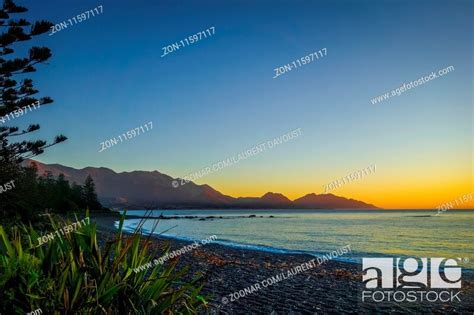 Sunset On Kaikoura Beach New Zealand Southern Island Stock Photo