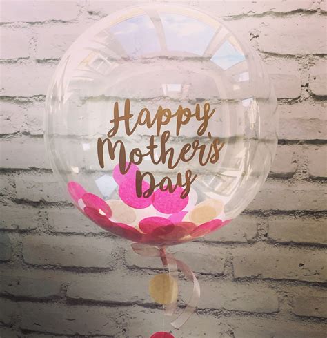 She carries you in her heart always. Pink confetti balloon with Happy Mother's Day message from ...