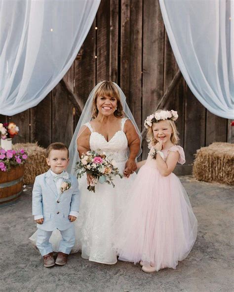little people big world amy roloff with ring bearer flower girl photo