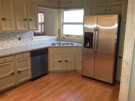 All slabs are treated with stoneguard sealer that protects. Kitchen design - taupe and white - azul platino granite ...