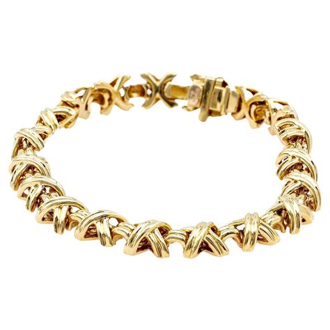 tiffany and co signature x 18k yellow gold classic vintage link bracelet for sale at 1stdibs