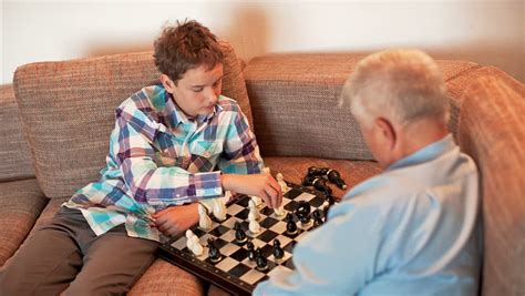 Attack On Horse The Game Of Chess Teen And Grandpa