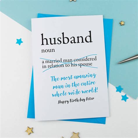 A Card That Says Husband On It Next To Some Stars And Confetti Sticks