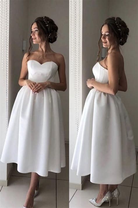 This white strapless wedding dress is well fitted like it was custom made for me. Bandeau Strapless Tea-length Casual Wedding Dresses 2020 ...