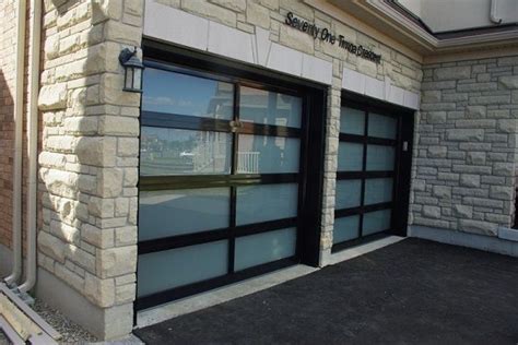 The number and thickness of the steel layers can help improve the maximum wind speed the door can withstand. Impact Glass Garage Doors | Garage doors, Glass garage ...