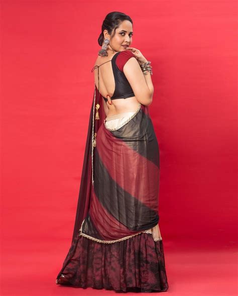 Anasuya Bharadwaj Gorgeous Looks In Floral Black Saree Photogallery Page 6